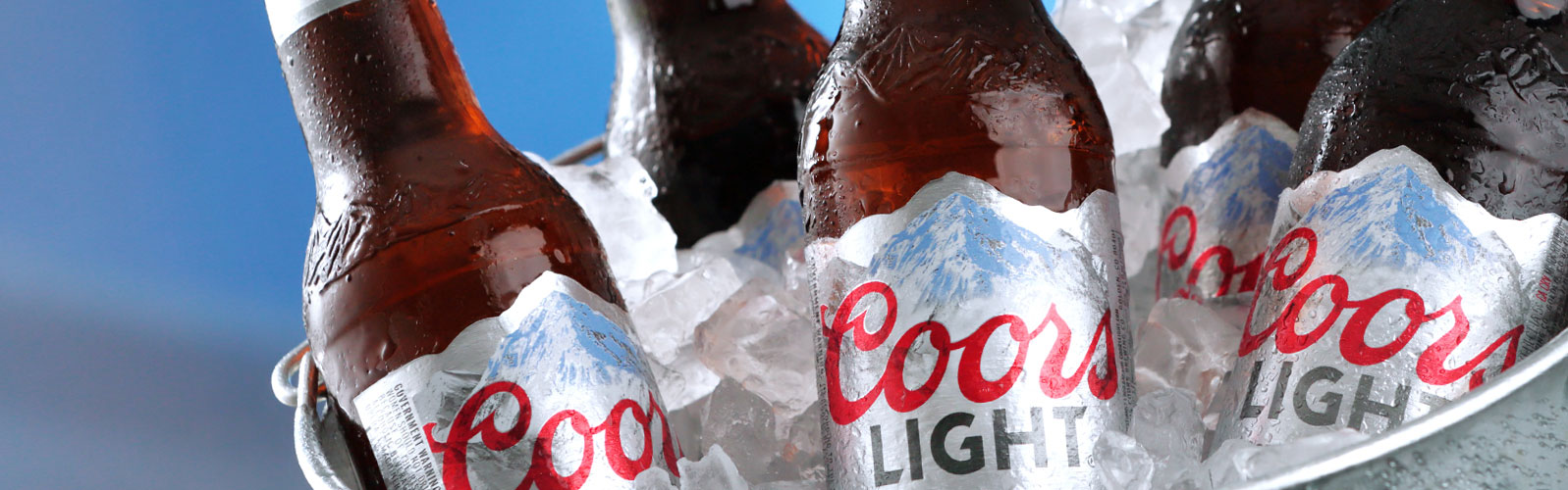 Coors Light mountains label by Inland